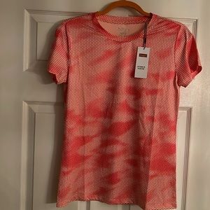 New with tags ZENGJO short sleeved Athletic Shirt. 17" PTP Camo print. Pink Sz M